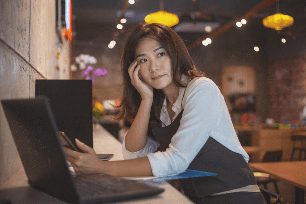 Worried business owner waiting for customers